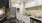 a kitchen with white cabinets